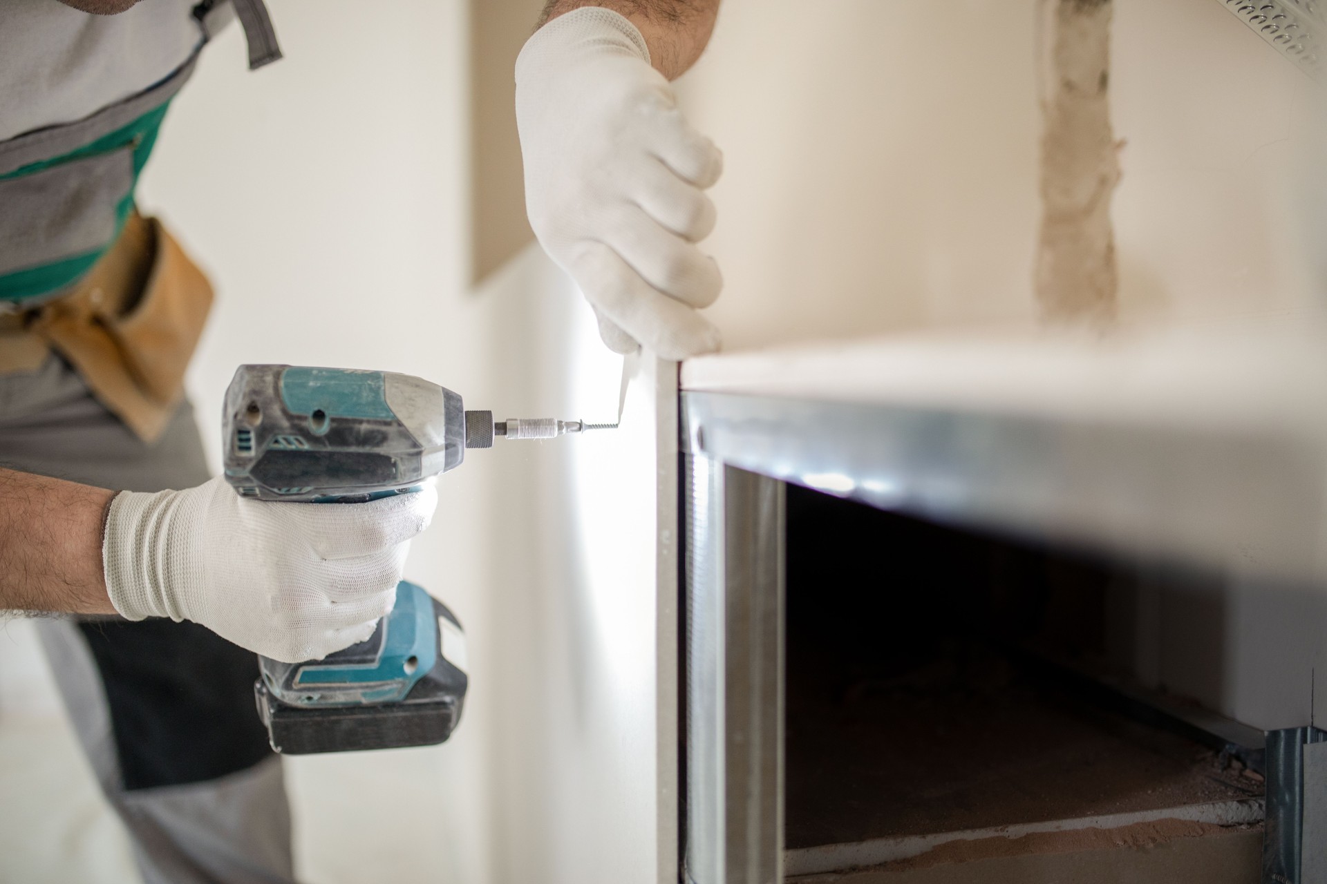 Drywall workers on construction site